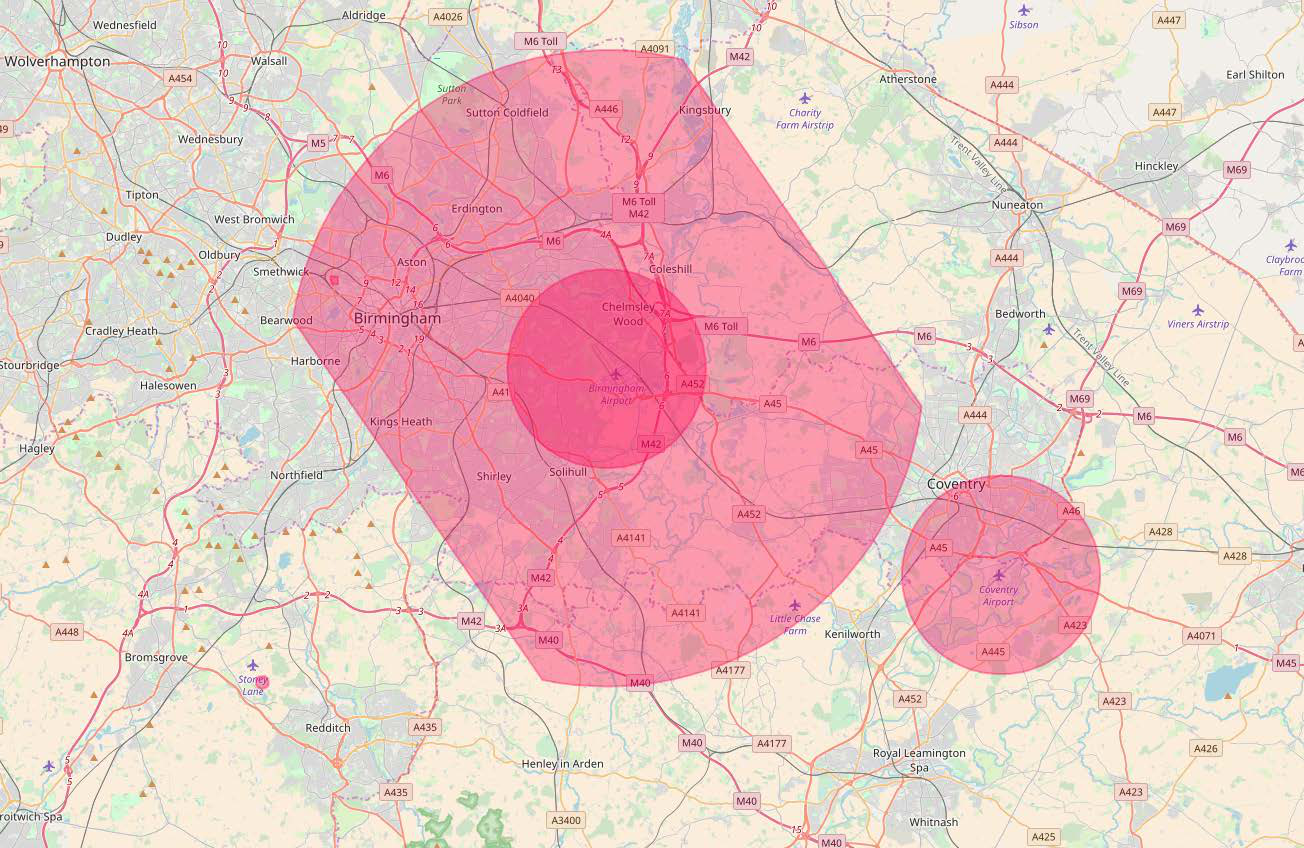 Map of the West Midlands, UK, centered on Birmingham and Coventry, showing red shaded areas indicating specific zones or service coverage.