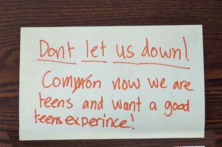 Handwritten note from teens requesting a good experience.
