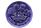 A close-up of a British One Pound coin, showing the reverse side with the royal crest.