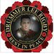 Circular memorial badge for Drummer Lee Rigby, featuring his portrait and text "REST IN PEACE".
