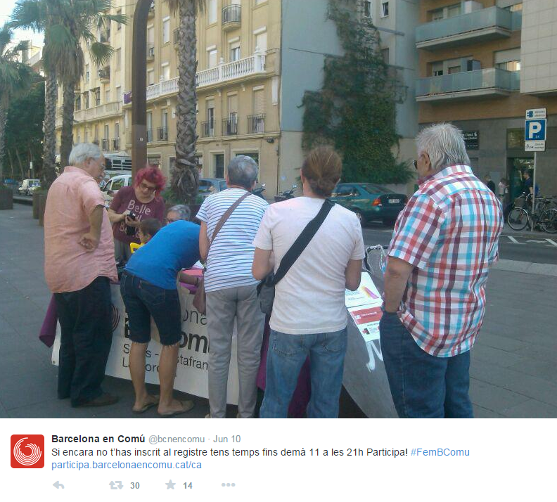 People gathered at a street table, possibly for registration, with a social media post below.