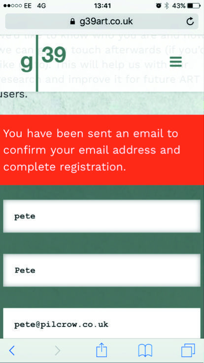Mobile phone screenshot of the g39art.co.uk website displaying a confirmation message that an email has been sent to complete registration.