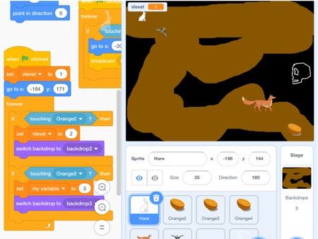 Screenshot of the Scratch programming environment, showing visual code blocks for game logic on the left and a game stage with sprites in a cave setting on the right.