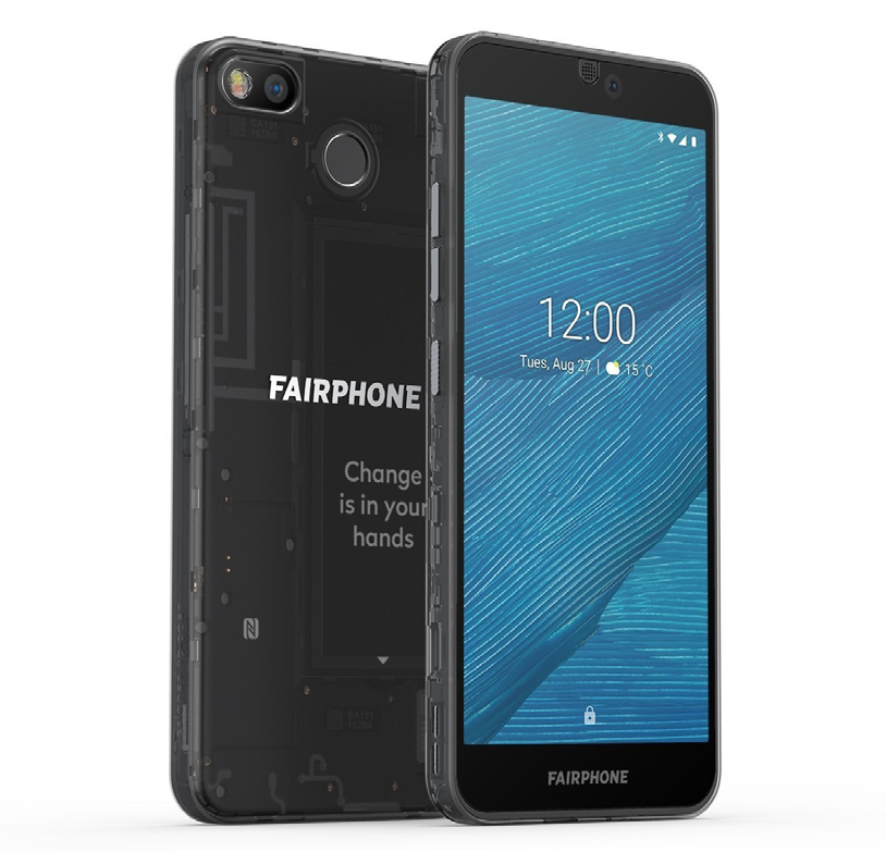 Two Fairphone smartphones. One displays the front screen with the time and date, the other shows the transparent back panel revealing internal circuitry and the text 'Change is in your hands'.