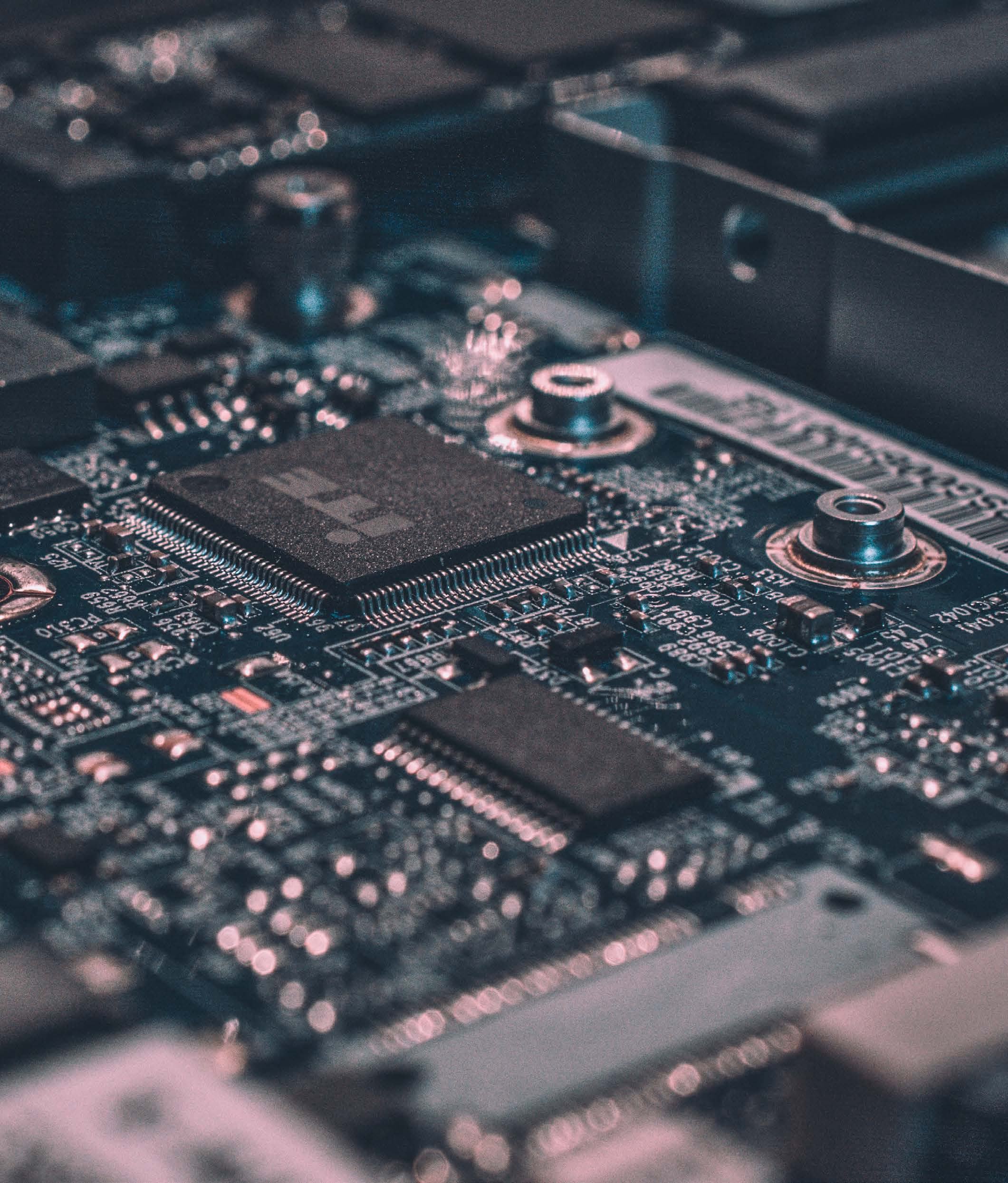 Close-up of a computer circuit board showing various electronic components and chips.