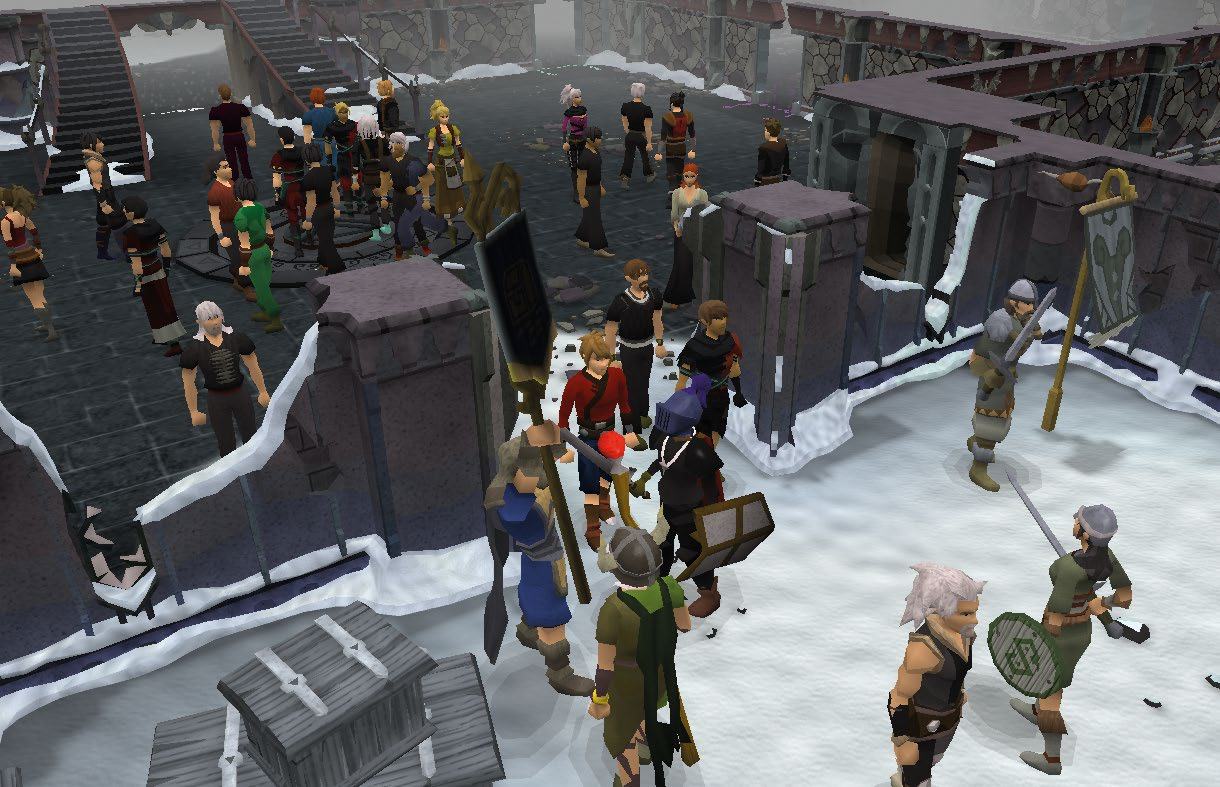 An overhead view of various animated characters, some with weapons, gathered in a snowy, stone-walled video game environment.