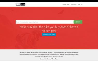 Screenshot of a website with a red background, a search bar for entering a frame or asset tag number, and text about checking a bike's history.