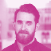 Headshot of a man with a full beard and dark hair looking forward, tinted pink.