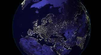 Satellite view of Europe and parts of Africa at night, showing illuminated city lights indicating population centers.