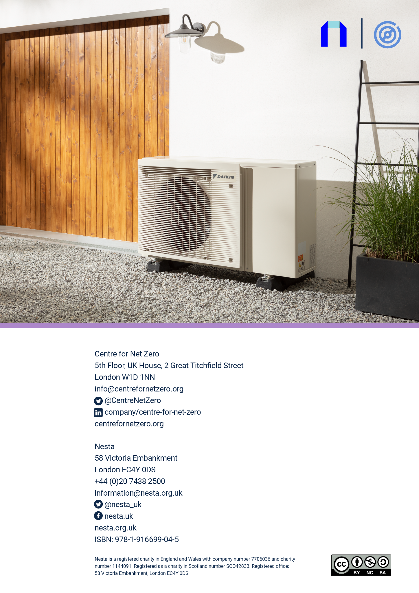 An outdoor Daikin air conditioning unit placed on a patio next to a wooden wall and potted plants.