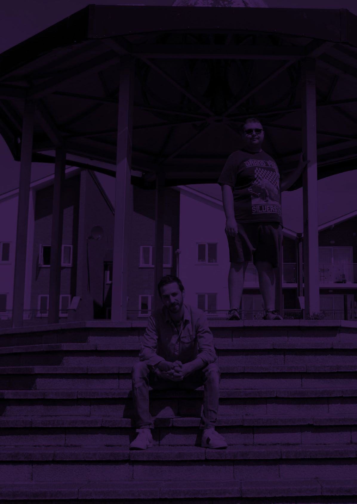 Two men, one sitting on steps and one standing under a gazebo, with a purple overlay.