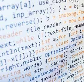 Close-up of computer code displayed on a screen, showing various programming language syntax.