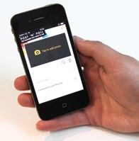 A hand holds a smartphone displaying an app interface with a "Tap to add photo" prompt and a camera icon.