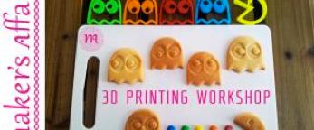3D PRINTING WORKSHOP' sign with colorful ghost-shaped 3D printed objects or cookie cutters, and similarly shaped brown cookies, illustrating items produced or used in the workshop.